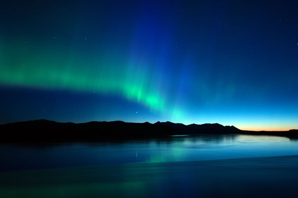 Northern Lights Over The Russian Mountains